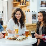 Smiling people with craft beer