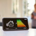 Smart Energy Meter In Kitchen Measuring Energy Efficiency With Figure In Background